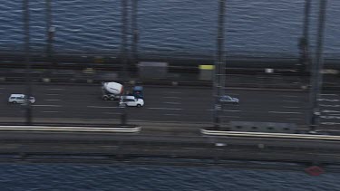 Sydney to Blue Mountains - Aerial - Sydney Harbour Bridge - Light Traffic - Tilt to up to North Sydney City