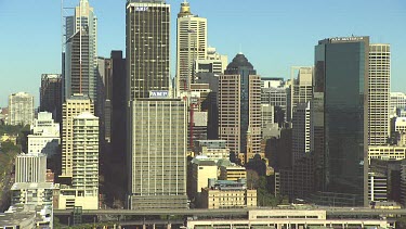 Sydney CBD city with tall office towers that overlook Circular Quay. The elevated highway in the foreground is the Cahill Express.