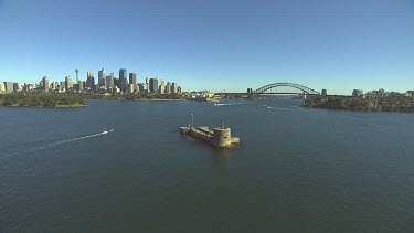 Fort Denison in Sydney Harbour. Also called Pinchgut. Relict of convict history. City and Opera House, Harbour bridge in background.