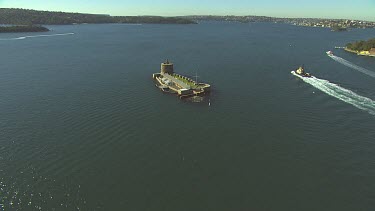 Fort Denison in Sydney Harbour. Also called Pinchgut. Relict of convict history. Water of harbour.