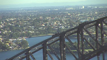 Sydney Harbour Bridge with tourists climbing bridge. Close Up.
