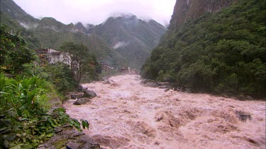 The rapids of the Urubamba river with the Sumaq Macgu Picchu hotel in the background