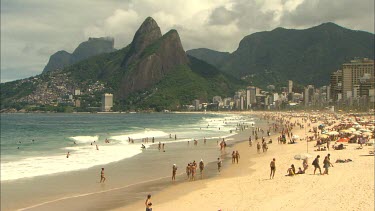 People enjoying the beaches of Rio De Janeiro