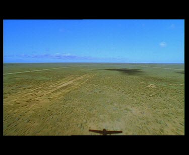 Nullarbor. Very flat expanse of desert plain.
