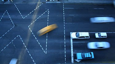 Pedestrians and traffic meet harmoniously in this busy city intersection. Pedestrian crossing.
