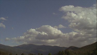 Timelapse of Boiling Clouds Over Mountains