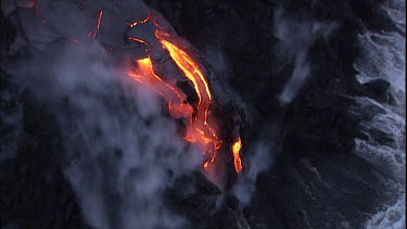 Lava flow, lava crust, lava delta and steam.