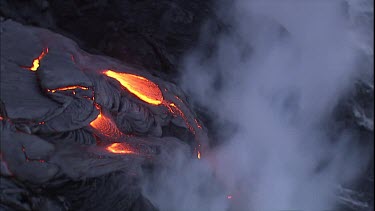 CU Lava flow, lava crust, lava delta and steam.