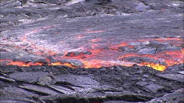 Lava flowing in channel. River of lava