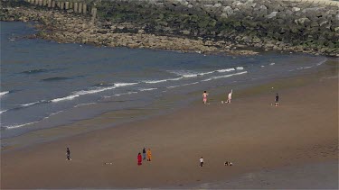 Children Playing On North Bay Beach, Scarborough, North Yorkshire, England