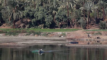 Men With Rowing Boat & Donkey, River Nile, Luxor, Egypt
