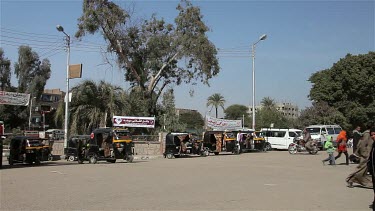 People & Tuc-Tucs Cross The Road, Nagaa El-Shaikh Abou Azouz, Egypt