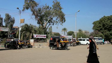 People & Tuc-Tucs Cross The Road, Nagaa El-Shaikh Abou Azouz, Egypt