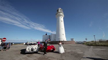 Wedding Couple, White Mk Ii Jaguar, Red Ferrari 458 Spider Cars & Lighthouse, Flamborough Head, North Yorkshire, England
