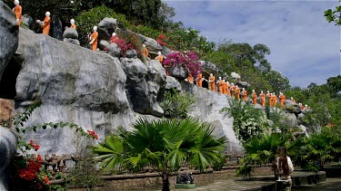 Line Of Monks In Orange Robes, Dambulla, Sri Lanka