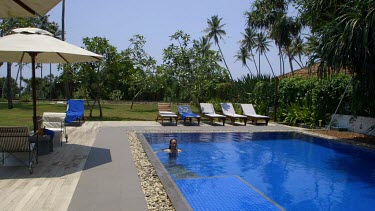 Woman Leaves Swimming Pool, Club Villa, Bentota, Sri Lanka