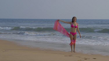 Model On Windy Beach In Pink Bikini, Bentota, Sri Lanka